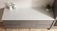Before And After: She Replaced Her Dark, Awkward 90S Kitchen Cabinets With Soft Oak And Pink Tiles