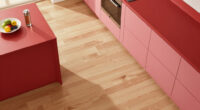 A “Lifeless” Kitchen Got A European-Style Redo With A Pink Island